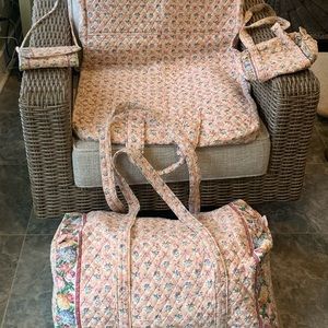 4 Pc Vera Bradley retired pattern 1 large duffel bag, 2 purses, 1 Garment Bag.